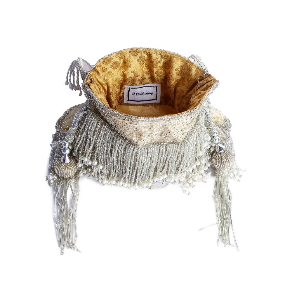 A Clutch Story Silver Patterned Batuas and Potlis