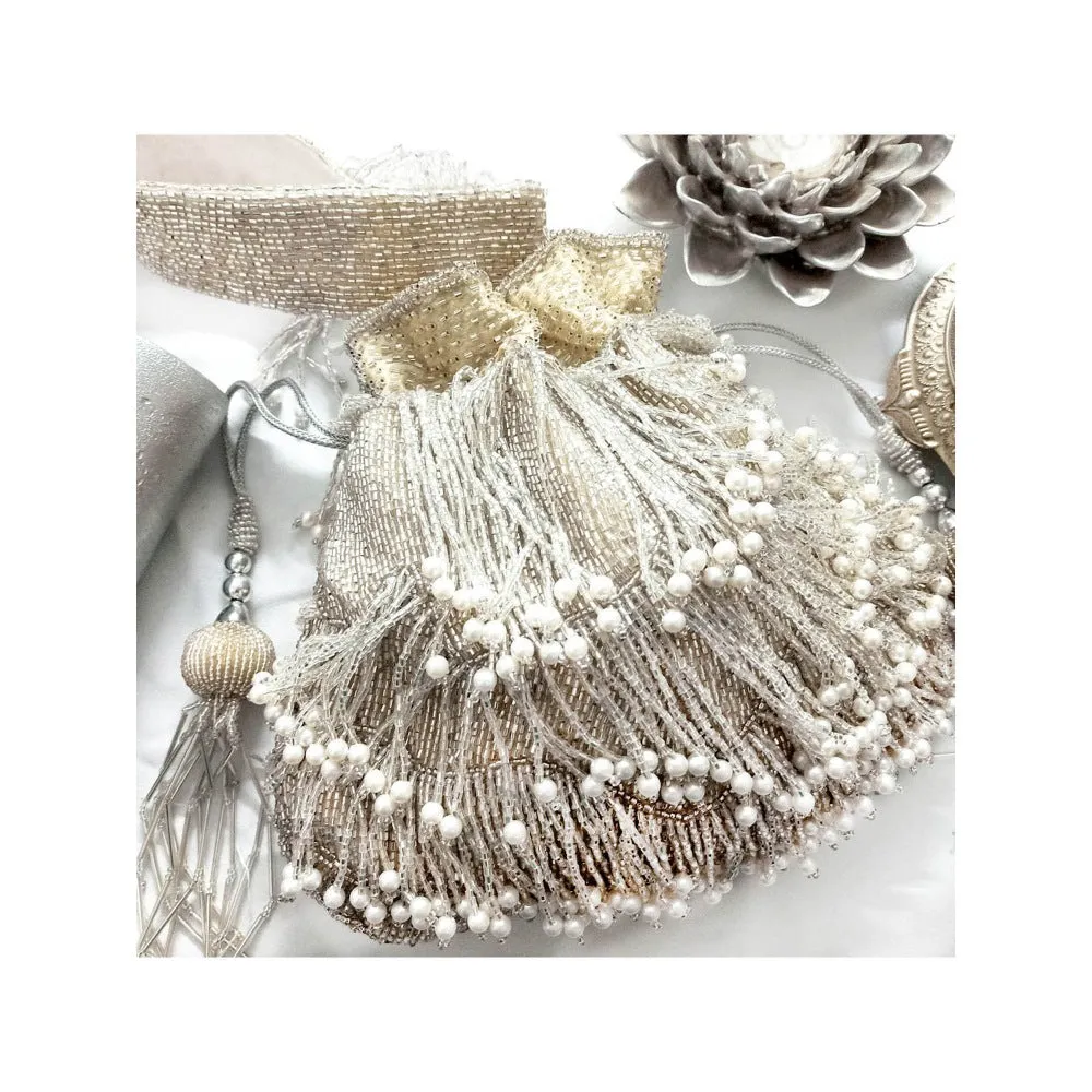 A Clutch Story Silver Patterned Batuas and Potlis
