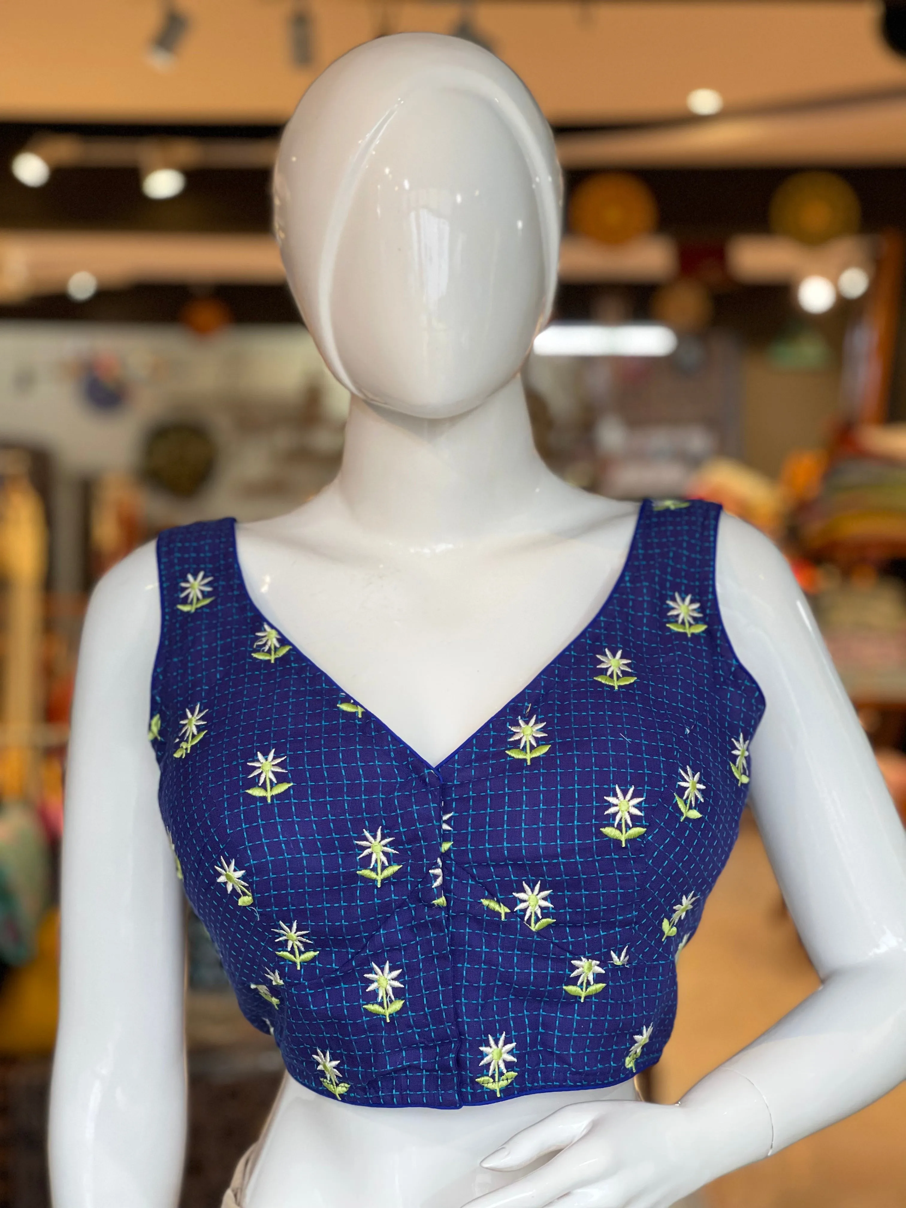 Blue checks sleeveless cotton blouse with floral embroidery