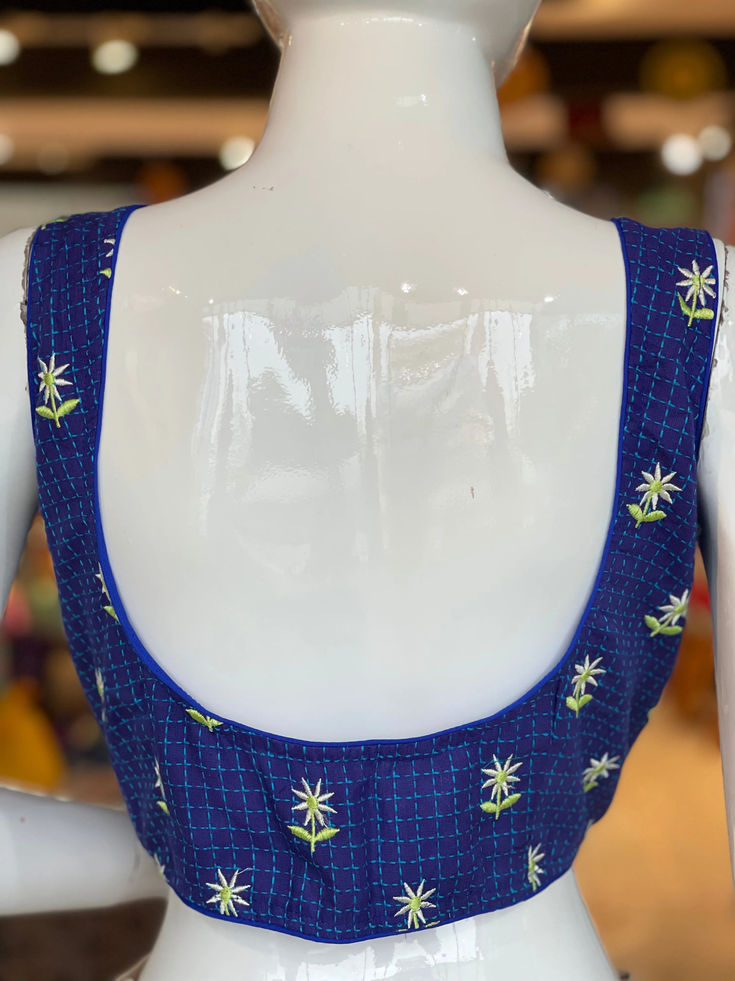 Blue checks sleeveless cotton blouse with floral embroidery